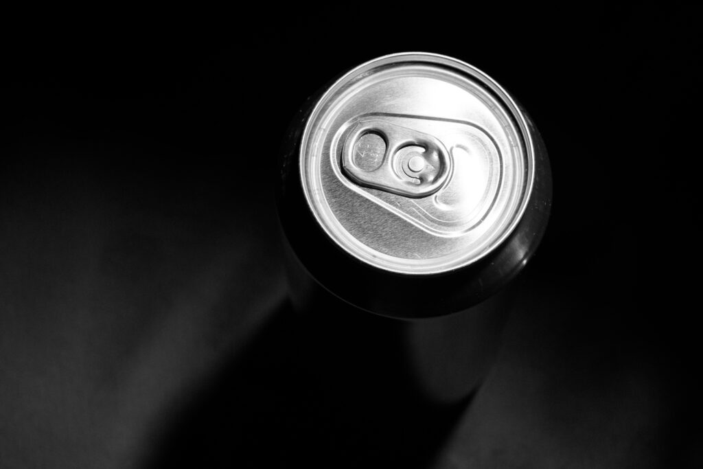Growing up with alcohol-dependent parents - a black and white photo of the top of a can of Bree. 